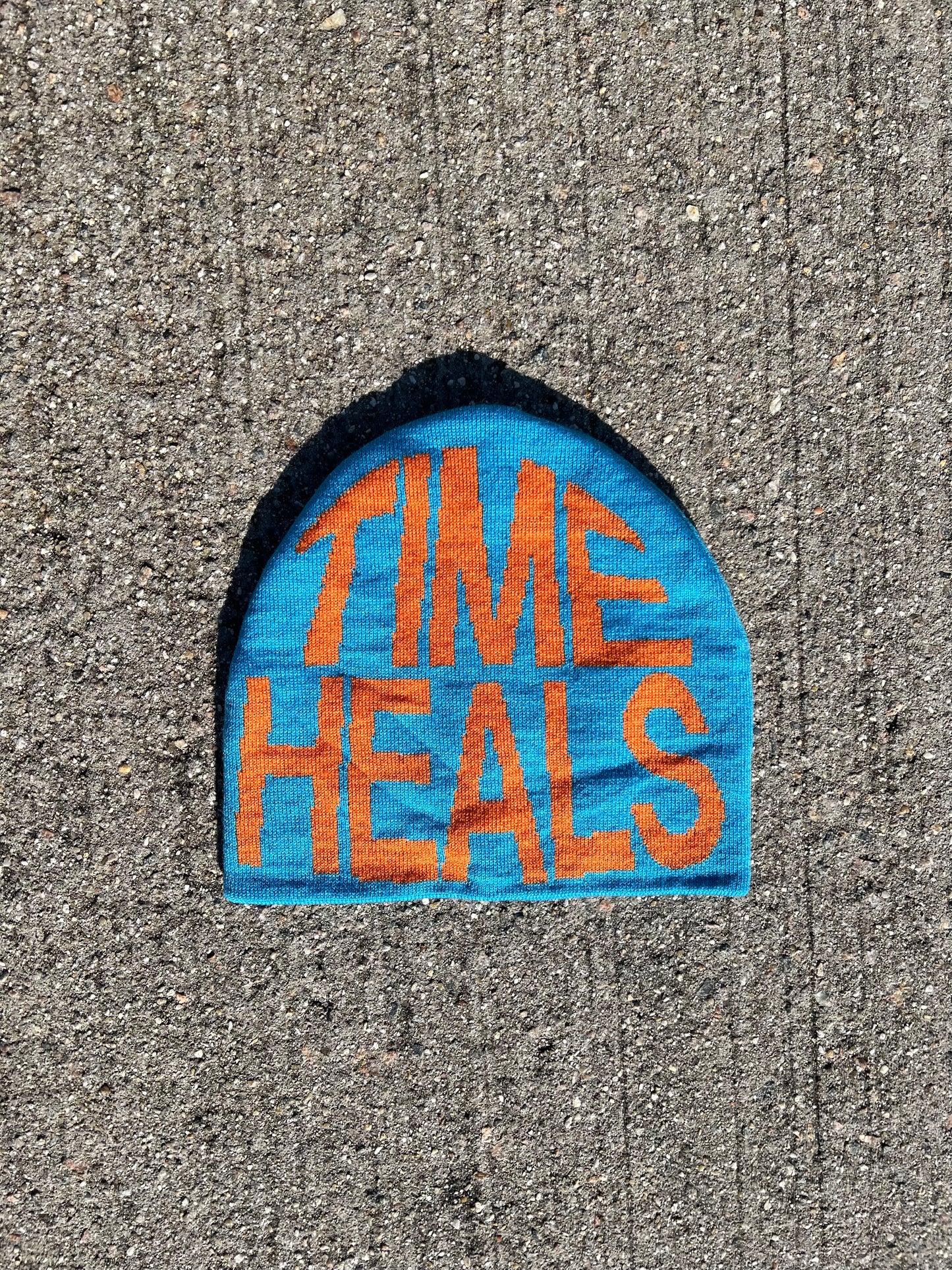 "TIME HEALS" Blue/Orange Jacquard Woven Beanie